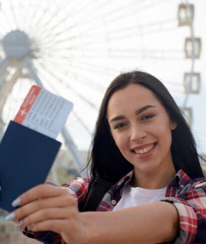 portrait-smiling-woman-showing-air-ticket-passport portrait-smiling-woman-showing-air-ticket-passport